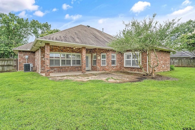 420 Colorado St, Van, TX 75790 - rear view of property featuring a patio area, a shingled roof, and brick siding