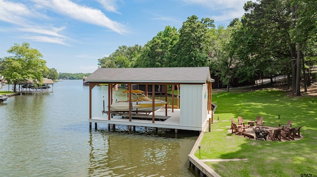 203 King Laurence Ct, Scroggins, TX 75480 - dock featuring boat lift, a water view, an outdoor fire pit, and a yard
