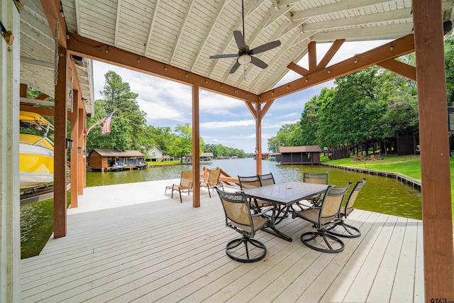 203 King Laurence Ct, Scroggins, TX 75480 - wooden terrace featuring a water view, a ceiling fan, a boat dock, and outdoor dining space