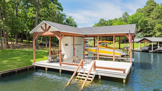 203 King Laurence Ct, Scroggins, TX 75480 - dock featuring boat lift, a water view, and a yard
