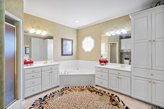 full bathroom featuring vanity, crown molding, a garden tub, and a stall shower