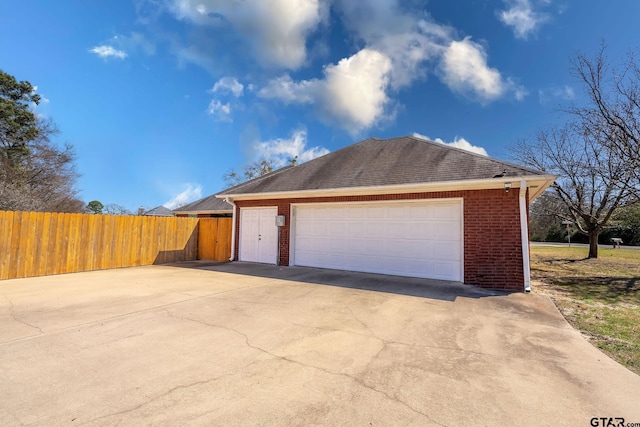 garage with fence