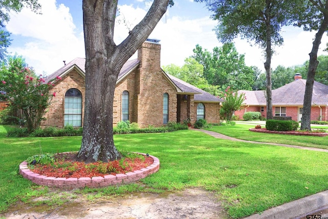 view of front of home with a front yard