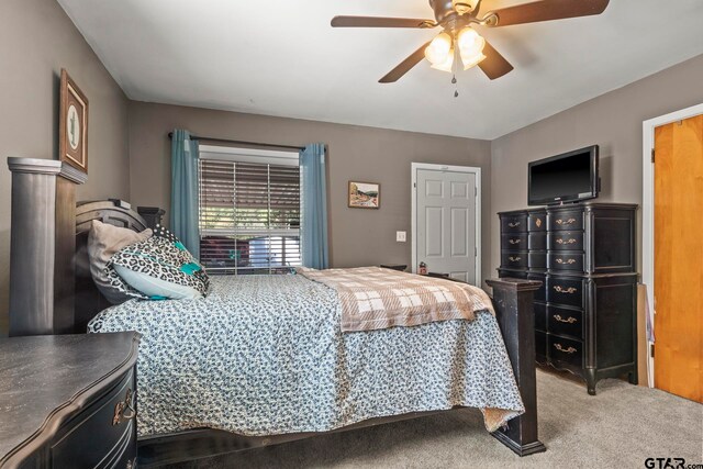 bedroom with carpet and ceiling fan