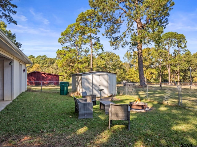 view of yard with a storage unit