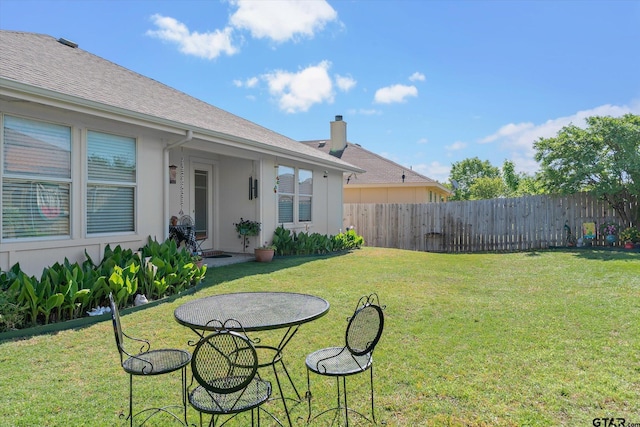 view of yard featuring fence