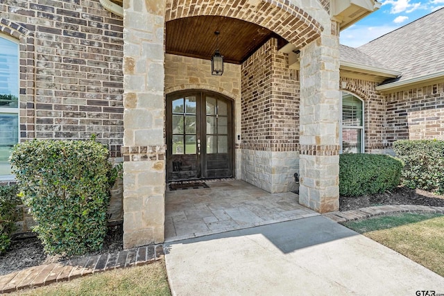 entrance to property featuring french doors