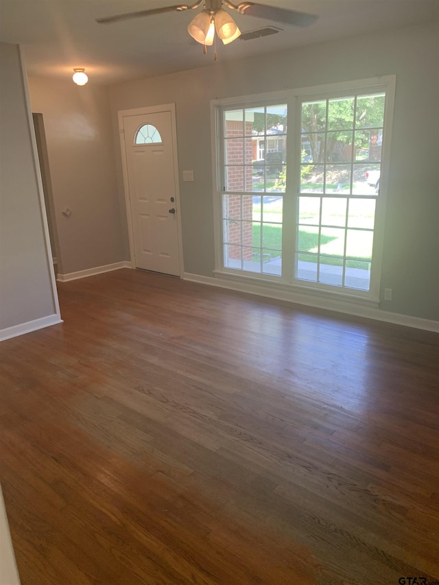 2326 Pleasant Dr, Tyler, TX 75701 - foyer with ceiling fan and dark wood-type flooring
