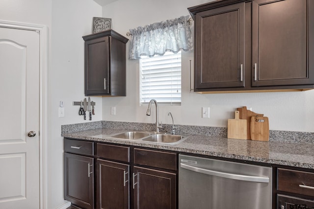901 Martin St, Chandler, TX 75758 - kitchen with stainless steel dishwasher and dark brown cabinets
