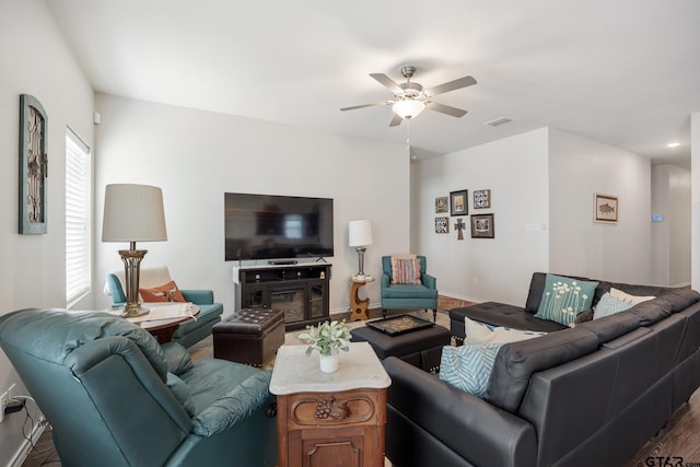 901 Martin St, Chandler, TX 75758 - living room featuring ceiling fan and wood finished floors