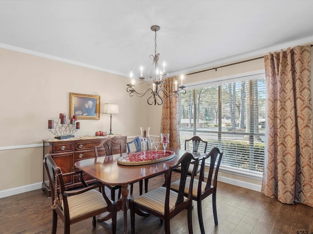 dining area with a notable chandelier, crown molding, and wood-type flooring