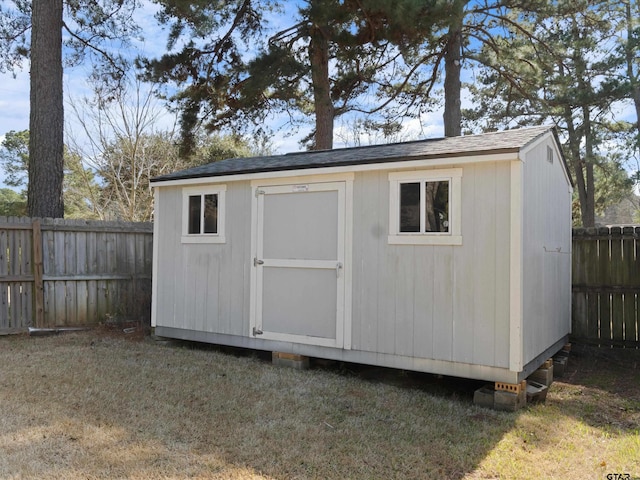 view of outdoor structure featuring a yard