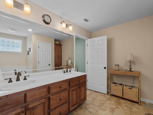 bathroom featuring vanity and tile patterned flooring