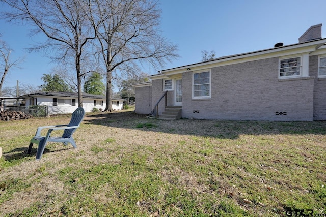 view of yard with entry steps