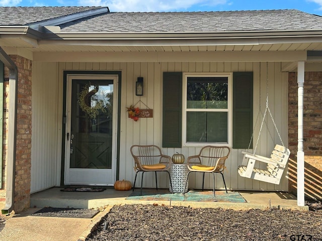 doorway to property featuring a porch