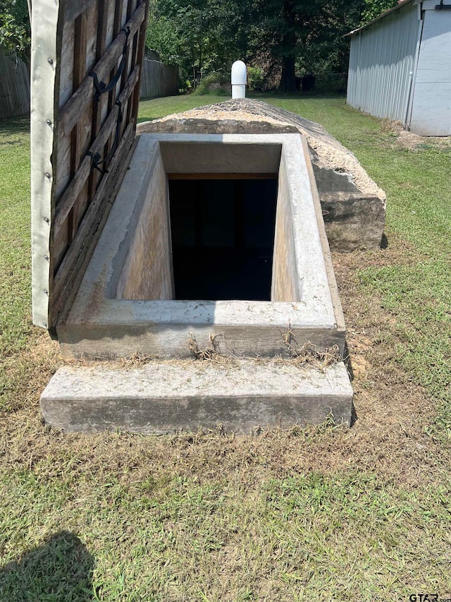 entry to storm shelter with a lawn