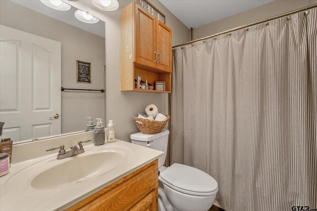 119 Vz County Road 4833, Chandler, TX 75758 - bathroom featuring toilet and vanity