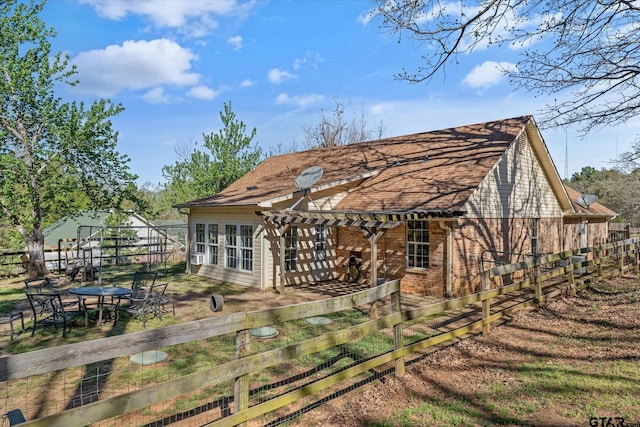 119 Vz County Road 4833, Chandler, TX 75758 - back of house featuring brick siding