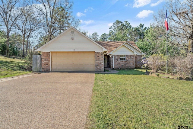 119 Vz County Road 4833, Chandler, TX 75758 - ranch-style house featuring brick siding, a garage, a front lawn, and concrete driveway