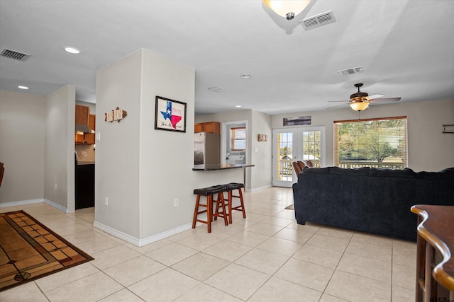 160 Lookout Point Dr, Grapeland, TX 75844 - living area with french doors, visible vents, and light tile patterned flooring