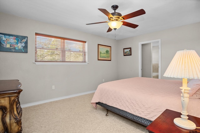 160 Lookout Point Dr, Grapeland, TX 75844 - carpeted bedroom featuring a ceiling fan and baseboards