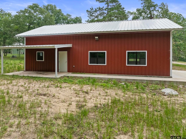 rear view of house featuring a patio area