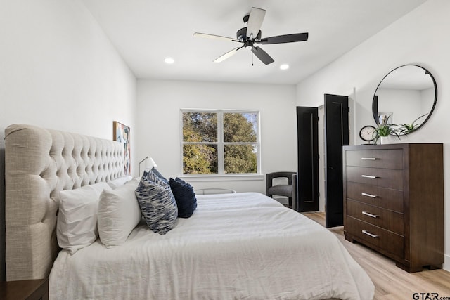 bedroom featuring recessed lighting, light wood finished floors, and ceiling fan