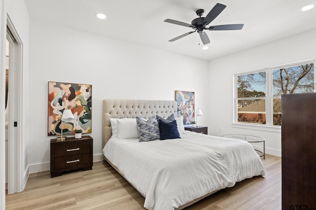 bedroom featuring recessed lighting, a ceiling fan, baseboards, and light wood-style floors