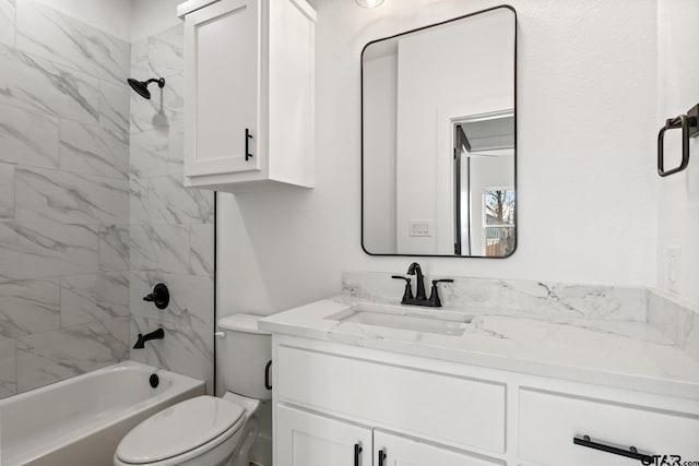 bathroom with toilet, bathing tub / shower combination, and vanity