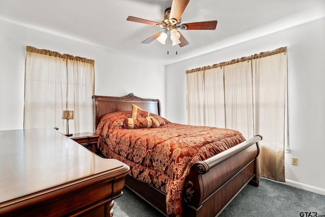 carpeted bedroom featuring ceiling fan