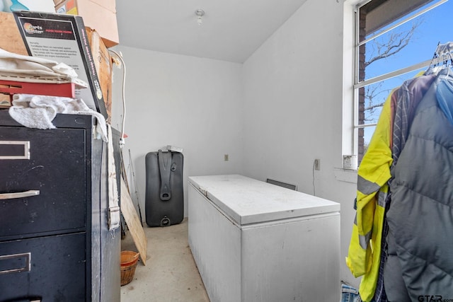 clothes washing area featuring plenty of natural light