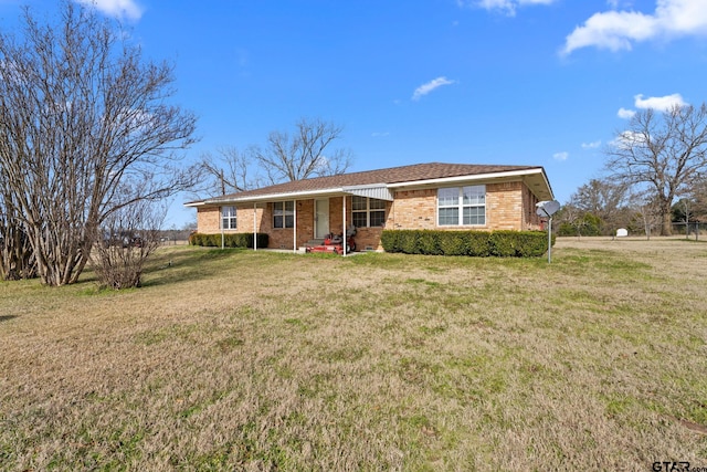 ranch-style house with a front yard