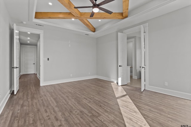 unfurnished bedroom with coffered ceiling, hardwood / wood-style floors, beam ceiling, and ornamental molding