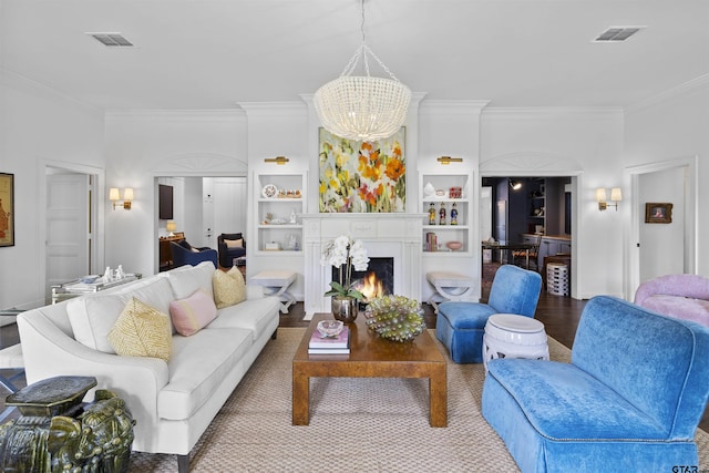 2417 Old Bullard Rd, Tyler, TX 75701 - living area with crown molding, a chandelier, a warm lit fireplace, and built in features
