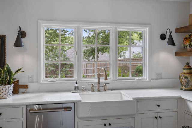 2417 Old Bullard Rd, Tyler, TX 75701 - kitchen with dishwasher, healthy amount of natural light, and light countertops