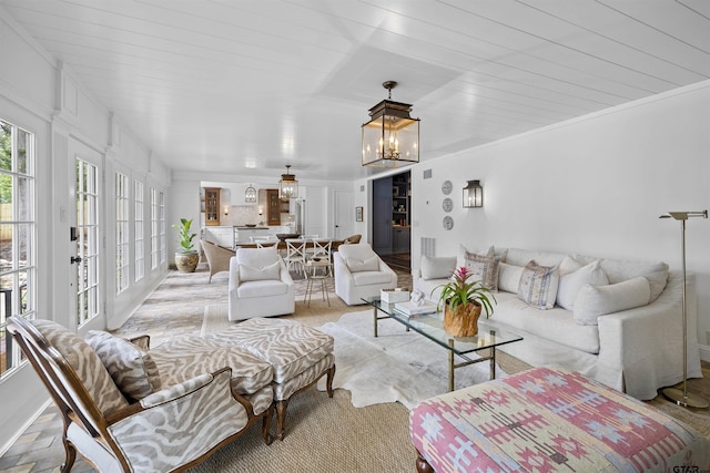 2417 Old Bullard Rd, Tyler, TX 75701 - living room with a chandelier and baseboards