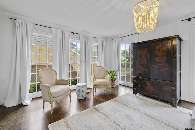 2417 Old Bullard Rd, Tyler, TX 75701 - sitting room with a chandelier, wood finished floors, and crown molding