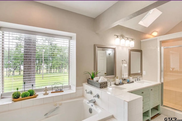 bathroom featuring vanity, a wealth of natural light, and separate shower and tub