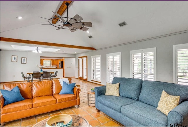 tiled living room featuring ceiling fan and lofted ceiling with beams