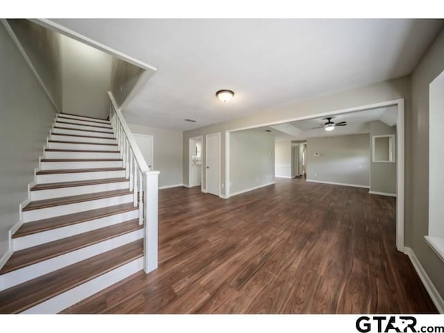 411 Lakeview St, Whitehouse, TX 75791 - unfurnished living room featuring stairway, wood finished floors, and a ceiling fan