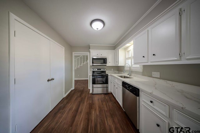 411 Lakeview St, Whitehouse, TX 75791 - kitchen featuring stainless steel appliances, dark wood-style flooring, white cabinets, and light stone countertops