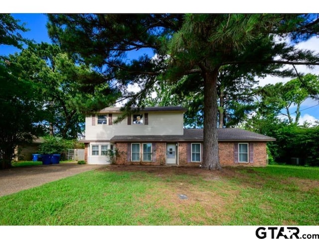 411 Lakeview St, Whitehouse, TX 75791 - view of front of property featuring brick siding, a front yard, and driveway