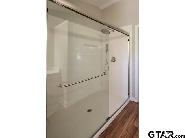 411 Lakeview St, Whitehouse, TX 75791 - full bath with a stall shower and wood finished floors