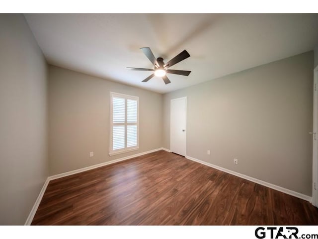 411 Lakeview St, Whitehouse, TX 75791 - empty room featuring ceiling fan and dark wood-type flooring