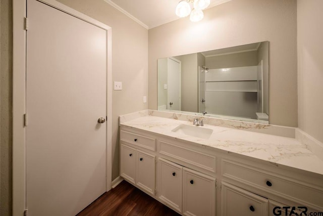 411 Lakeview St, Whitehouse, TX 75791 - bathroom with vanity, wood finished floors, and ornamental molding