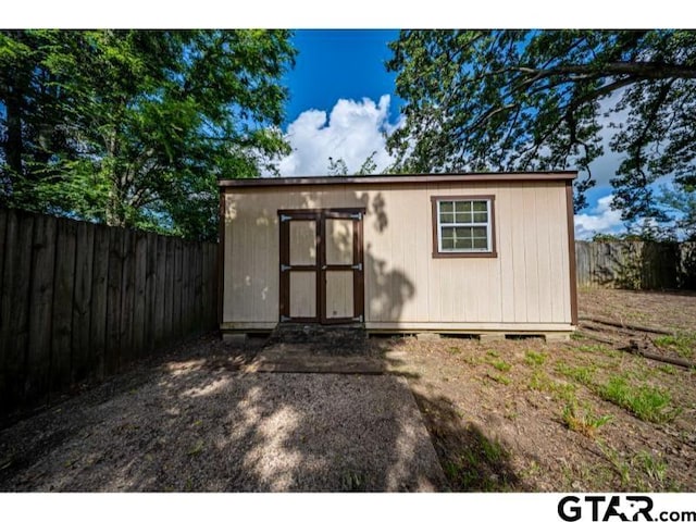 411 Lakeview St, Whitehouse, TX 75791 - view of shed with a fenced backyard