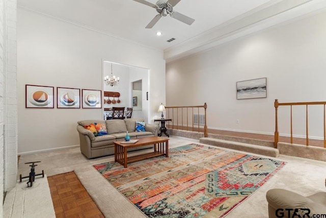 living room featuring ornamental molding, recessed lighting, baseboards, and ceiling fan with notable chandelier