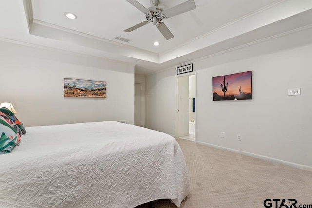 carpeted bedroom featuring baseboards, visible vents, a raised ceiling, ornamental molding, and recessed lighting