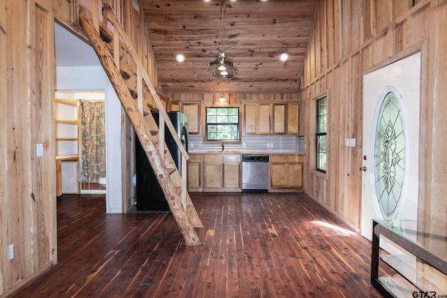 kitchen featuring dishwasher, wood walls, dark wood-type flooring, vaulted ceiling, and wood ceiling