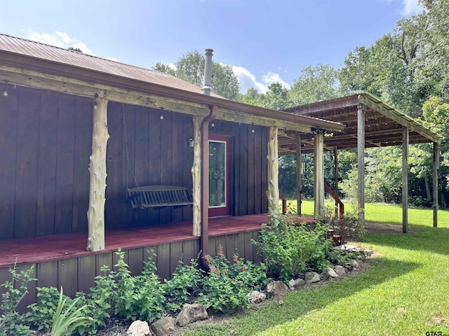 view of home's exterior featuring a yard